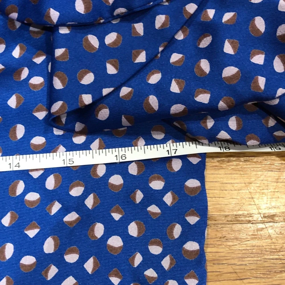 Authentic kate spade NWOT Blue top with design